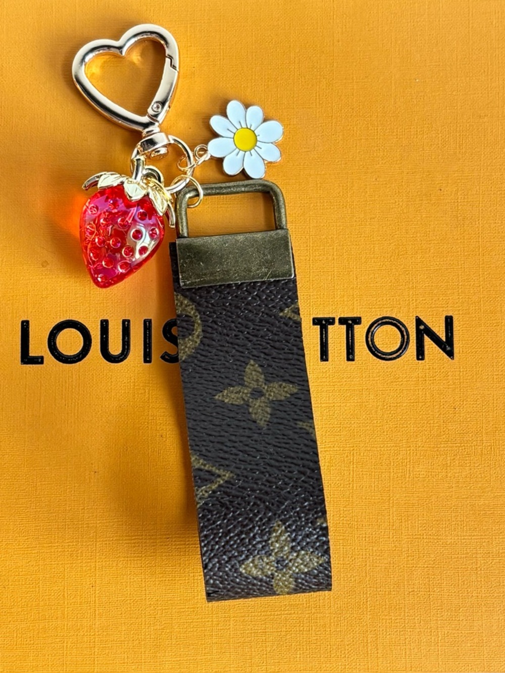 Authentic Louis Vuitton
Monogram Keychain, Bag Charm, 5.25 inches long.Upcycled